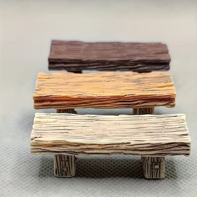 Miniature zen pagoda figurines set on a wooden table